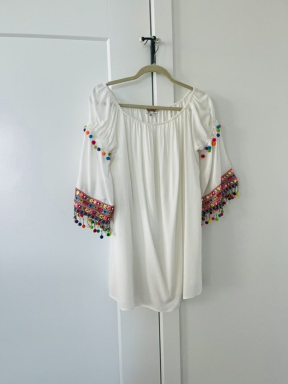 Bohemian white dress with pom poms XS. The dress is lined Stellah
